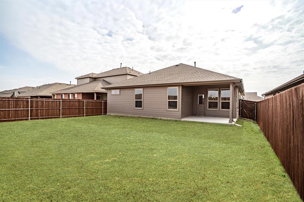 1864 Mensa Drive Haslet, TX 76052 - Photo 35 of 40 a view of a house with garden