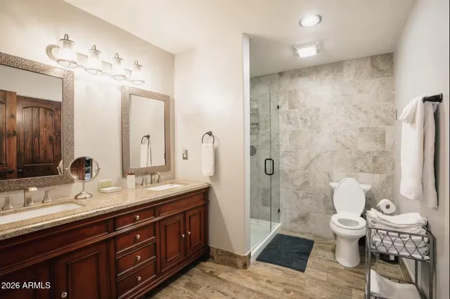 a bath room with a sink and a mirror
