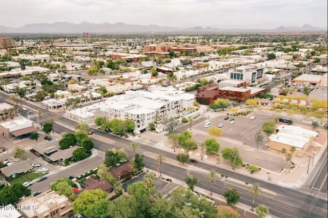an aerial view of a city with lots of residential buildings