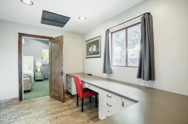 a room with furniture and window