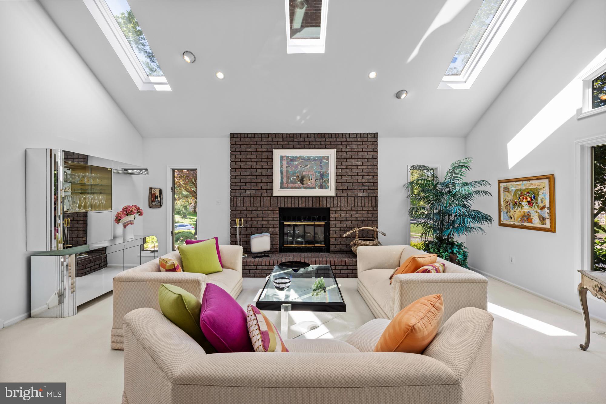 503 Birch Drive Cherry Hill, NJ 08003 - Photo 7 of 51 a living room with furniture flower pot and a fireplace