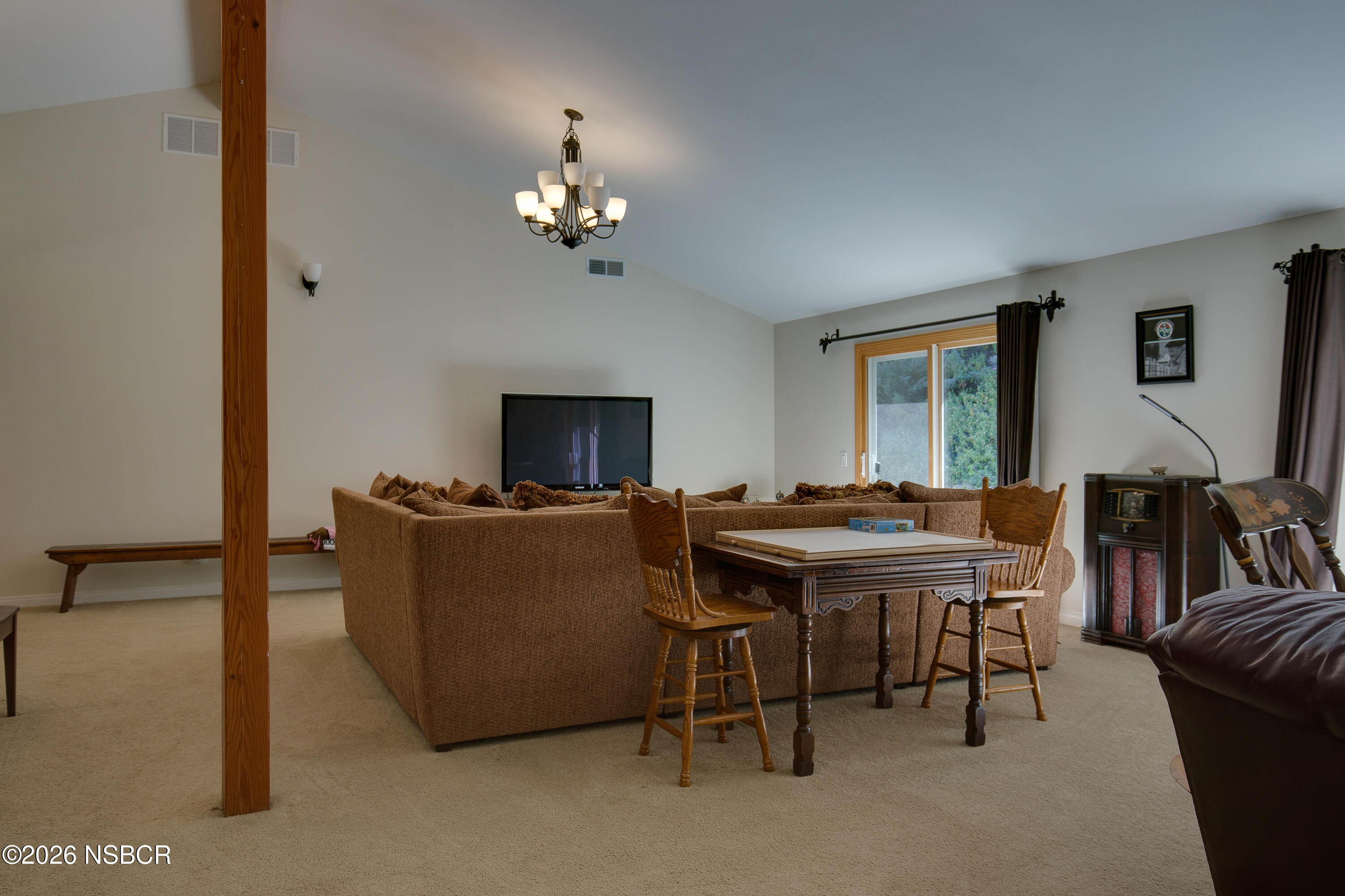 850 Fredensborg Canyon Road Solvang, CA 93463 - Photo 4 of 26 a view of a livingroom with furniture and a chandelier