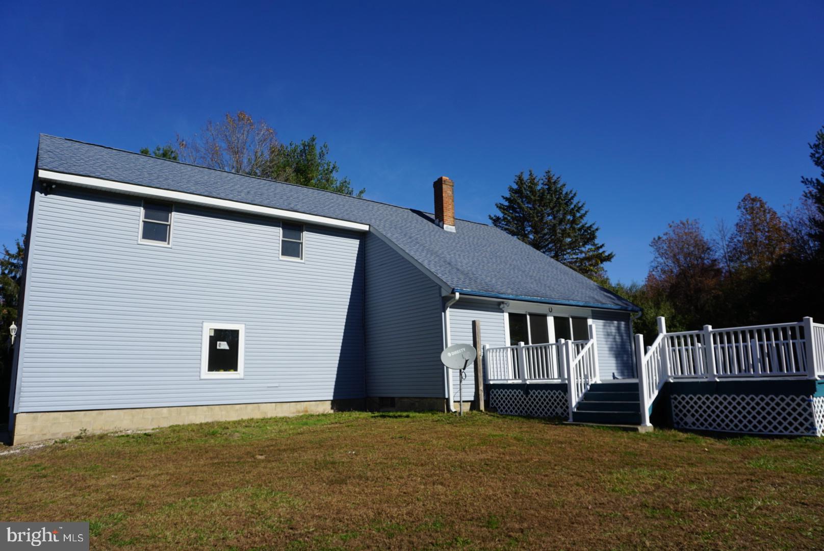 642 Stow Creek Road Bridgeton, NJ 08302 - Photo 20 of 25 a view of a house with a yard