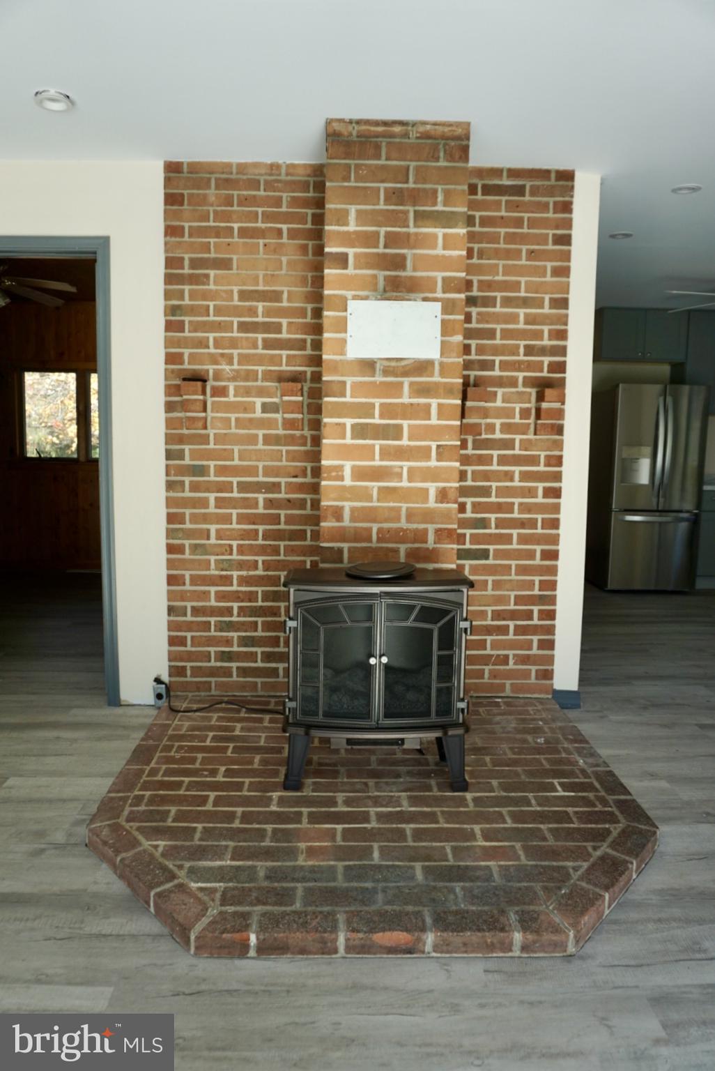 642 Stow Creek Road Bridgeton, NJ 08302 - Photo 3 of 25 a view of empty room with wooden floor
