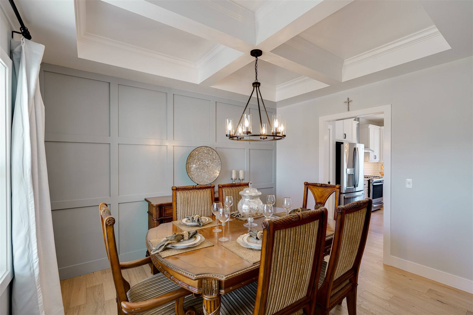 18 Red Maple Court Bloomington, IL 61705 - Photo 16 of 48 a view of a dining room with furniture a chandelier and wooden floor