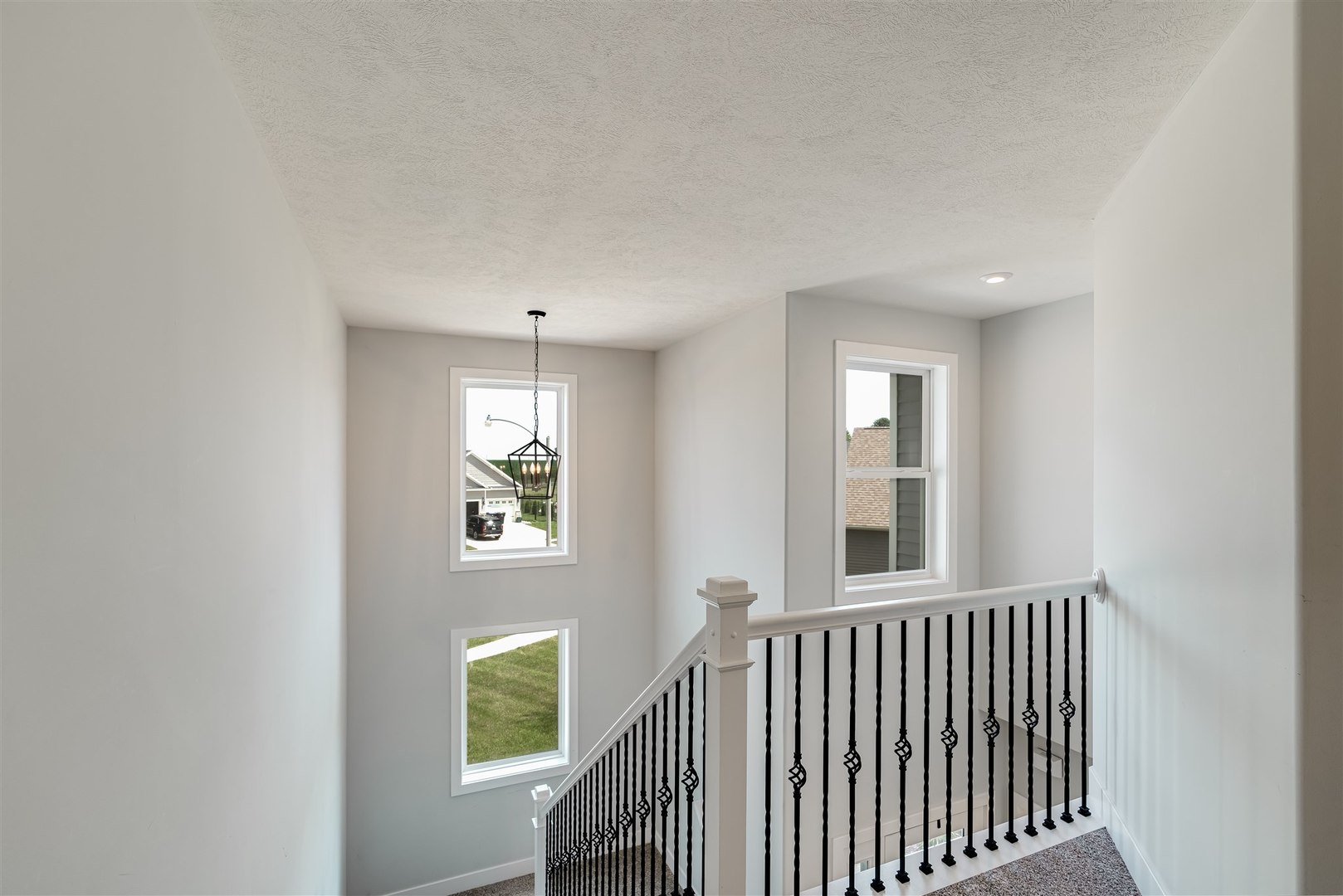 18 Red Maple Court Bloomington, IL 61705 - Photo 21 of 48 a view of hallway with windows