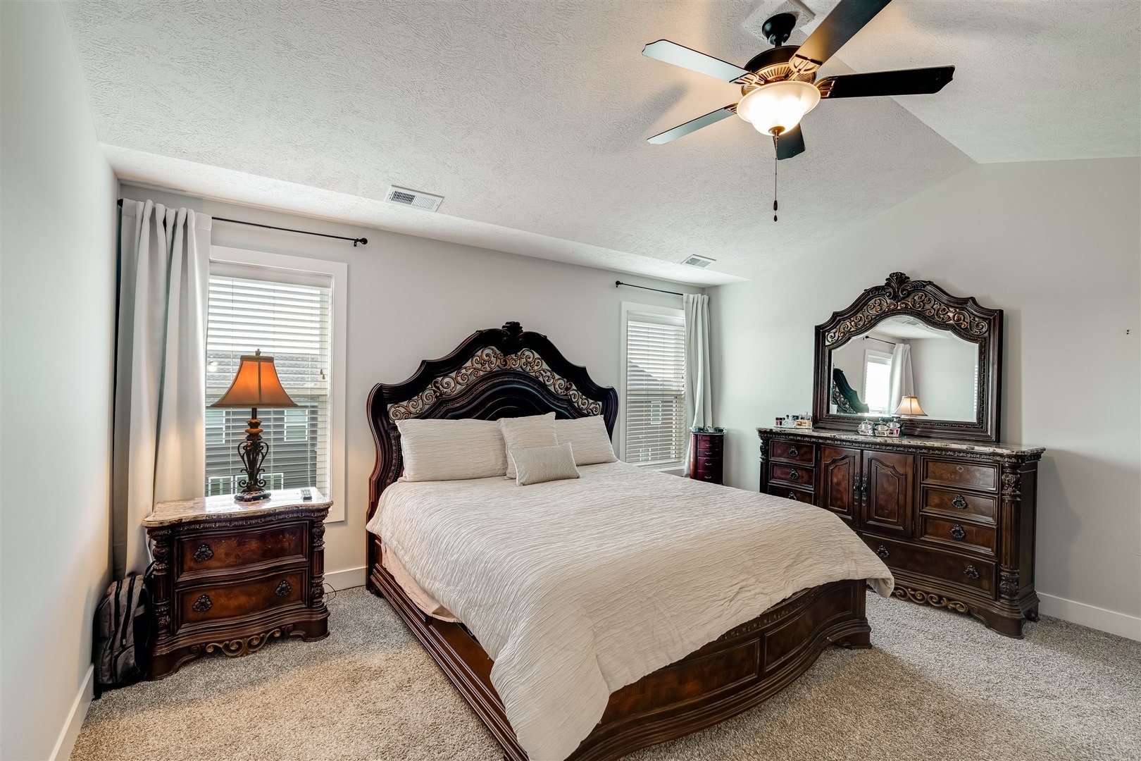 18 Red Maple Court Bloomington, IL 61705 - Photo 23 of 48 a bedroom with a bed and wooden floor