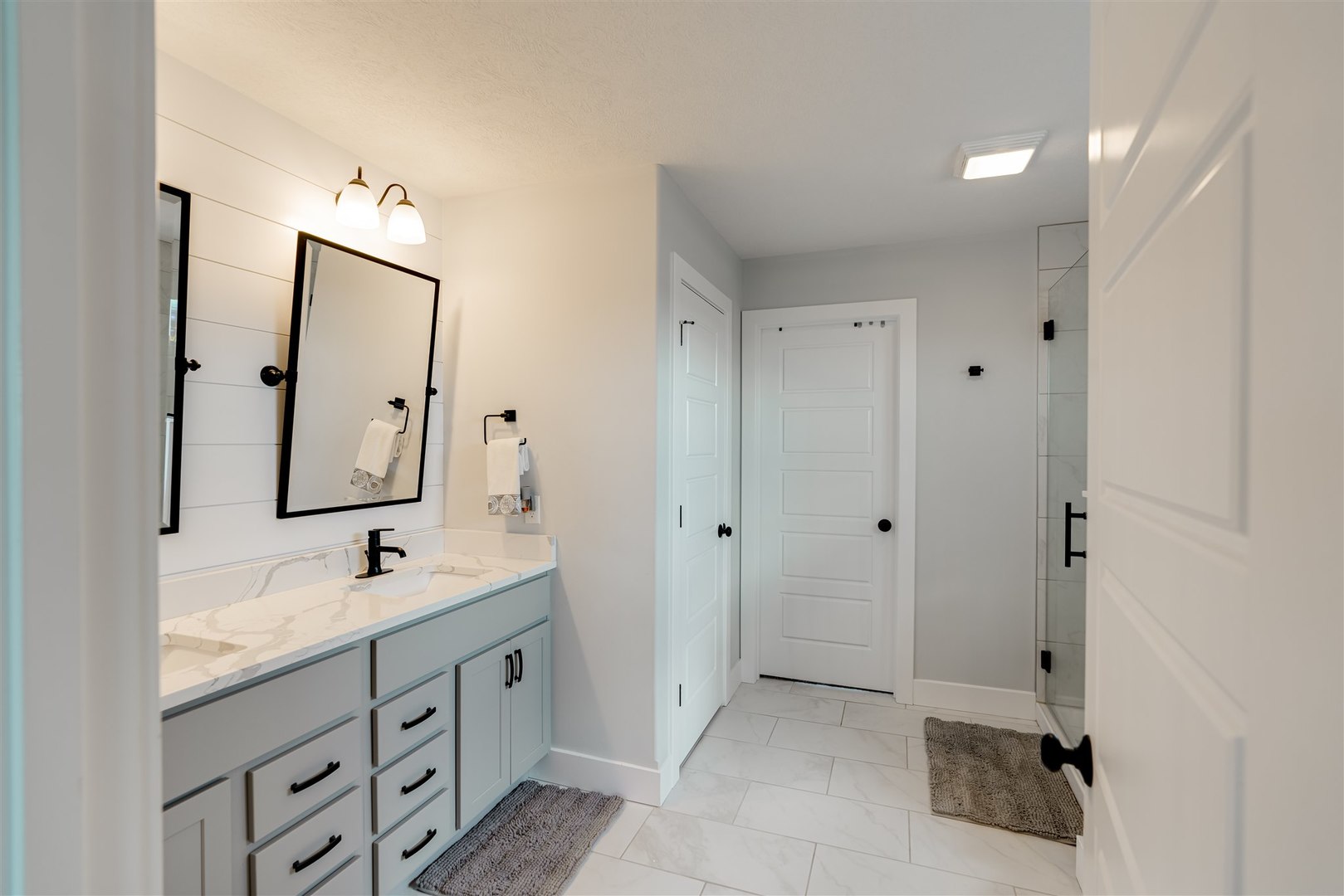 18 Red Maple Court Bloomington, IL 61705 - Photo 24 of 48 a bathroom with a double vanity sink mirror and double