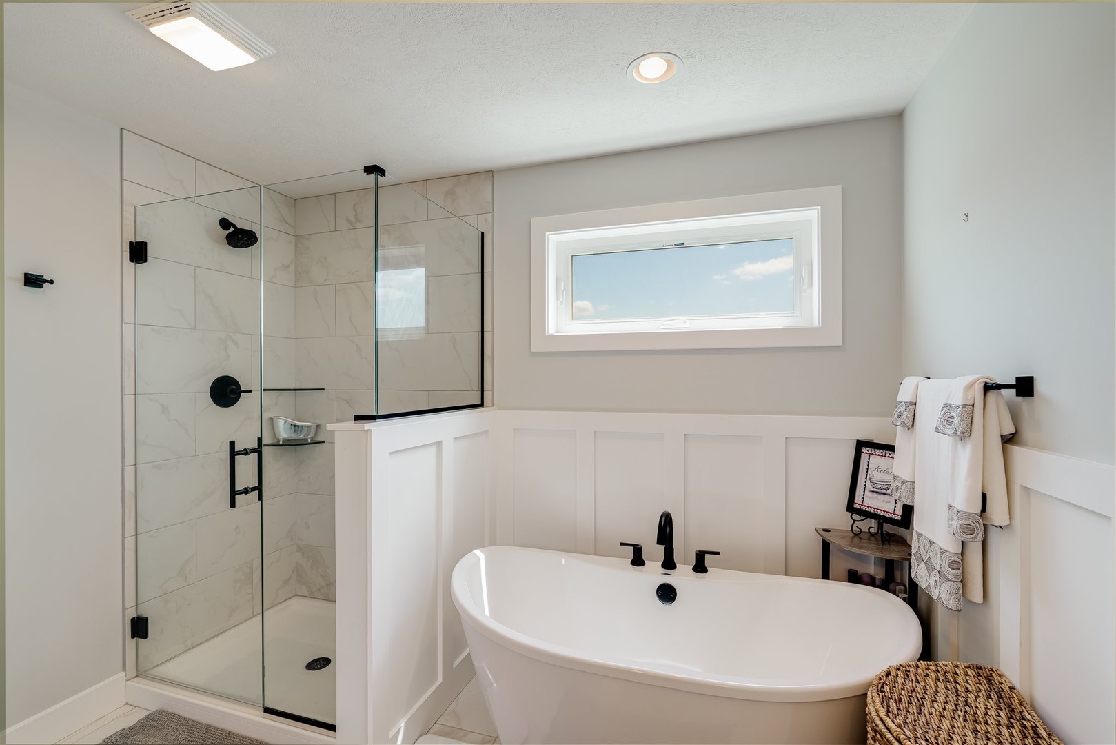 18 Red Maple Court Bloomington, IL 61705 - Photo 28 of 48 a bathroom with a tub shower sink and mirror