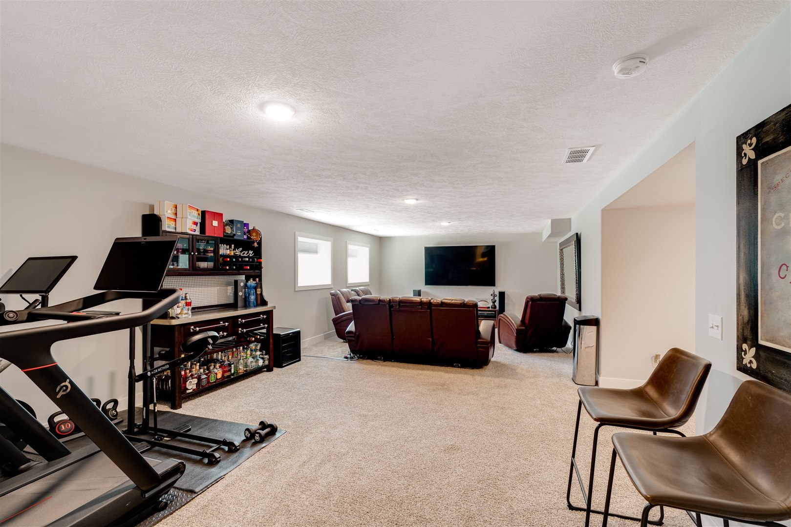 18 Red Maple Court Bloomington, IL 61705 - Photo 36 of 48 a living room with furniture a flat screen tv and a window