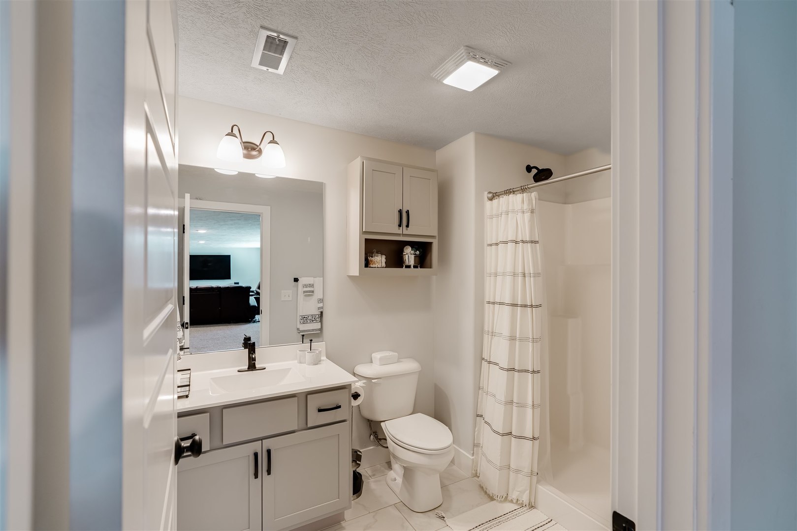 18 Red Maple Court Bloomington, IL 61705 - Photo 37 of 48 a bathroom with a sink toilet and shower