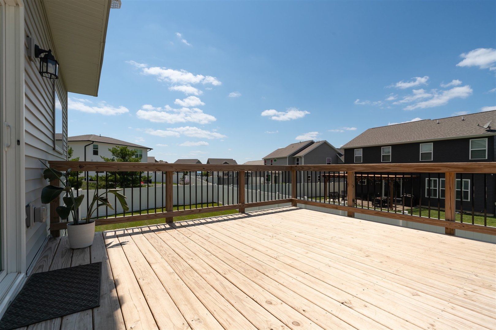 18 Red Maple Court Bloomington, IL 61705 - Photo 43 of 48 a view of a house with a wooden deck