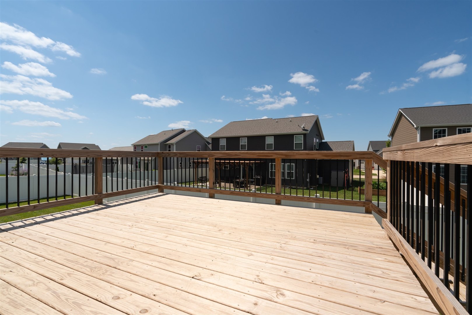 18 Red Maple Court Bloomington, IL 61705 - Photo 44 of 48 a view of a house with wooden deck