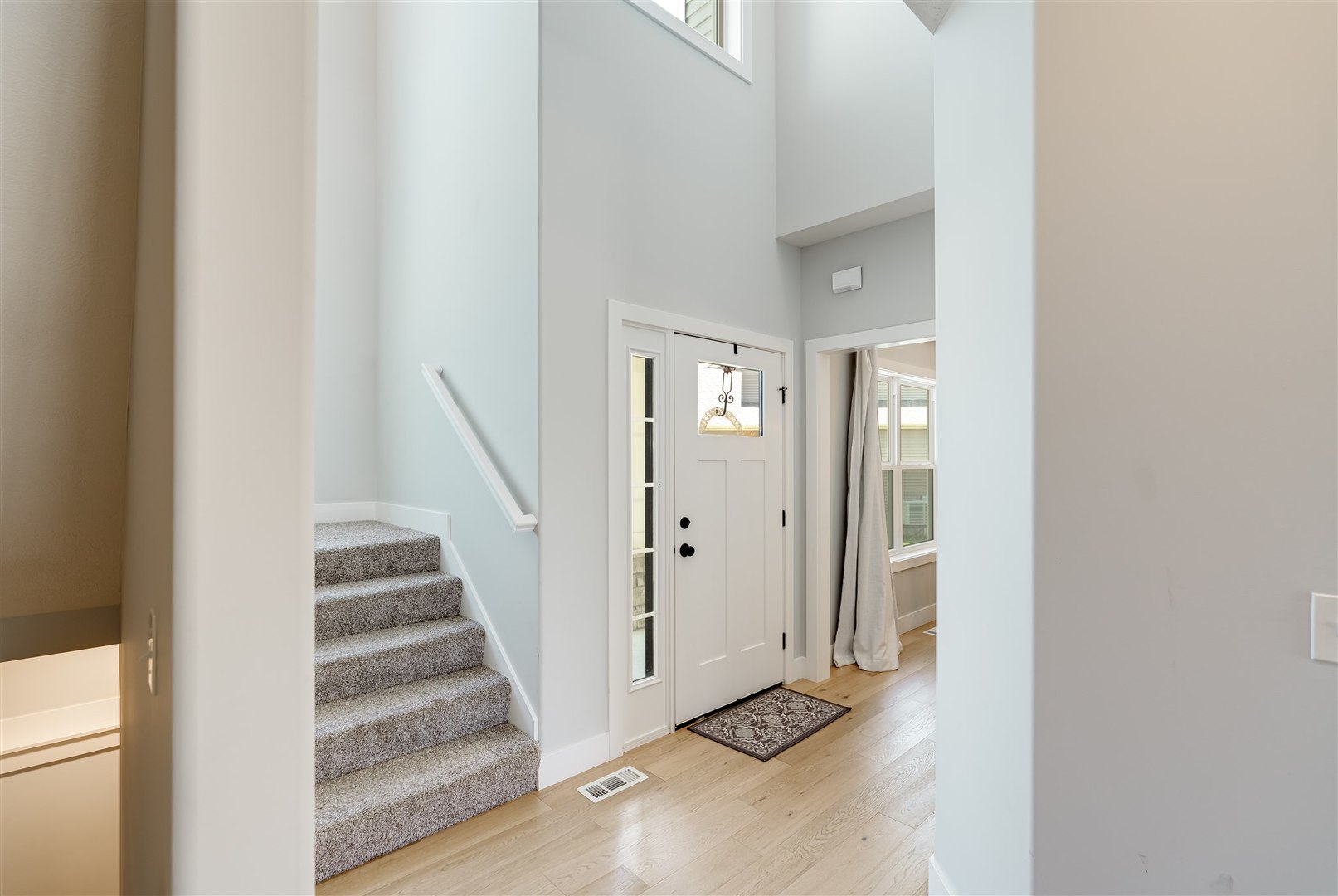 18 Red Maple Court Bloomington, IL 61705 - Photo 6 of 48 a view of a hallway with staircase