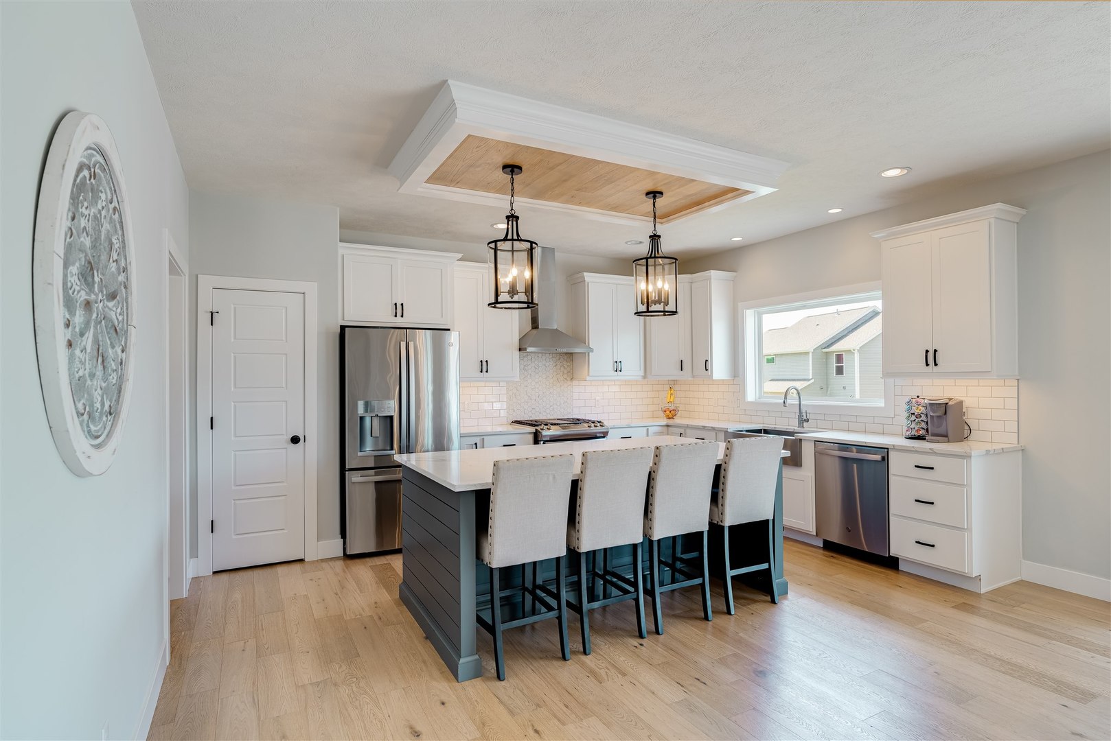 18 Red Maple Court Bloomington, IL 61705 - Photo 7 of 48 a large kitchen with a table and chairs