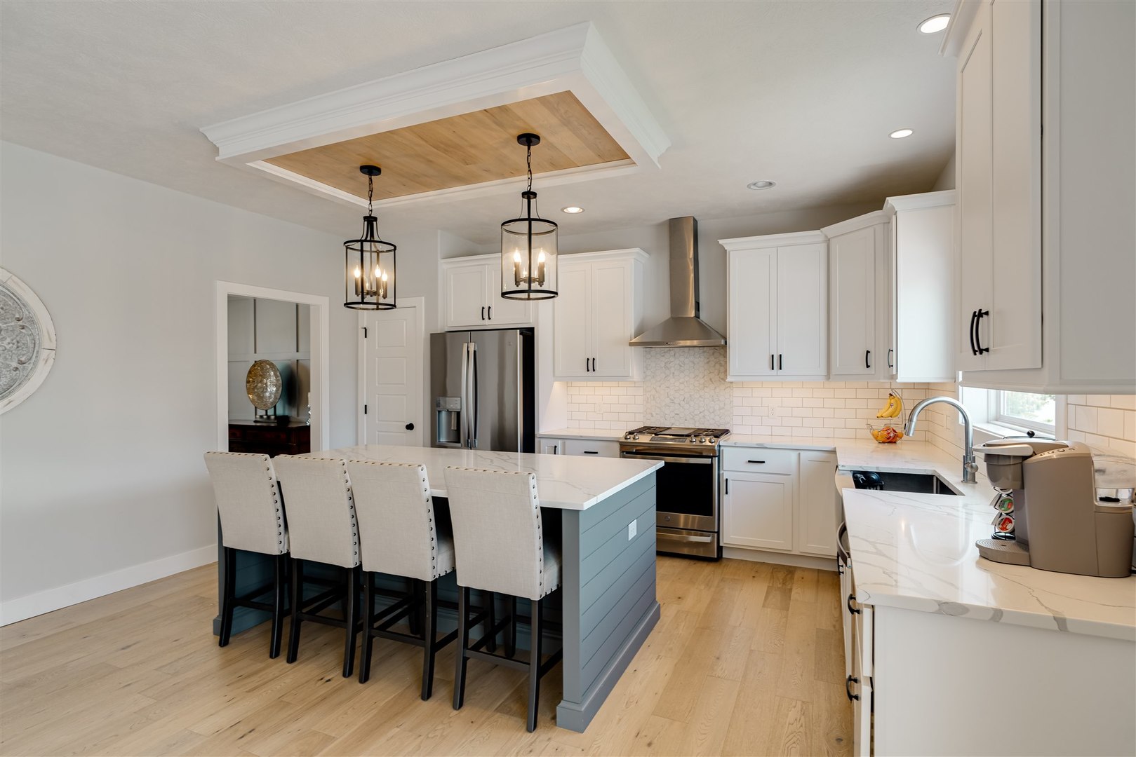 18 Red Maple Court Bloomington, IL 61705 - Photo 9 of 48 a large kitchen with a table and chairs in it