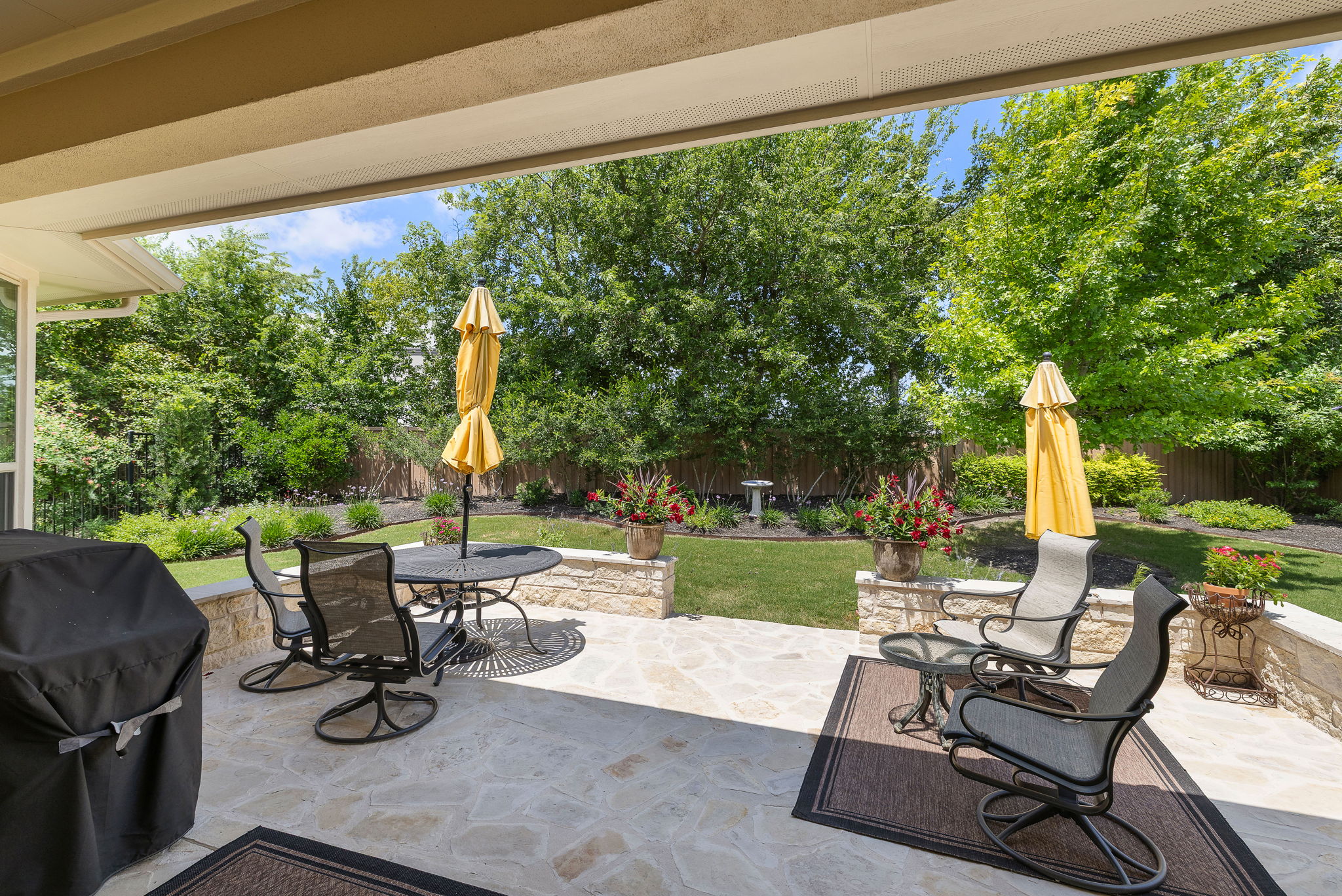5016 Yucca Flower Lane Georgetown, TX 78626 - Photo 31 of 31 a view of a patio with chairs and plants