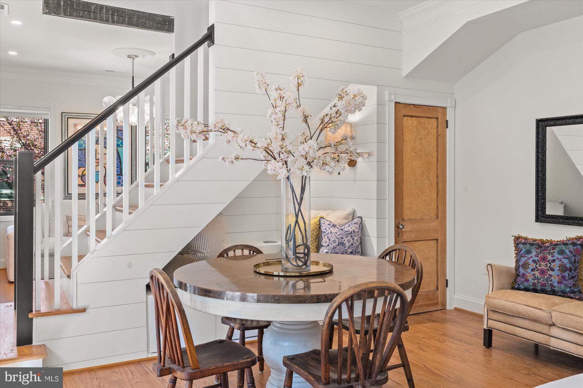 629 Pickford Place Northeast Washington, DC 20002 - Photo 14 of 41 a view of a dining room with furniture and a chandelier