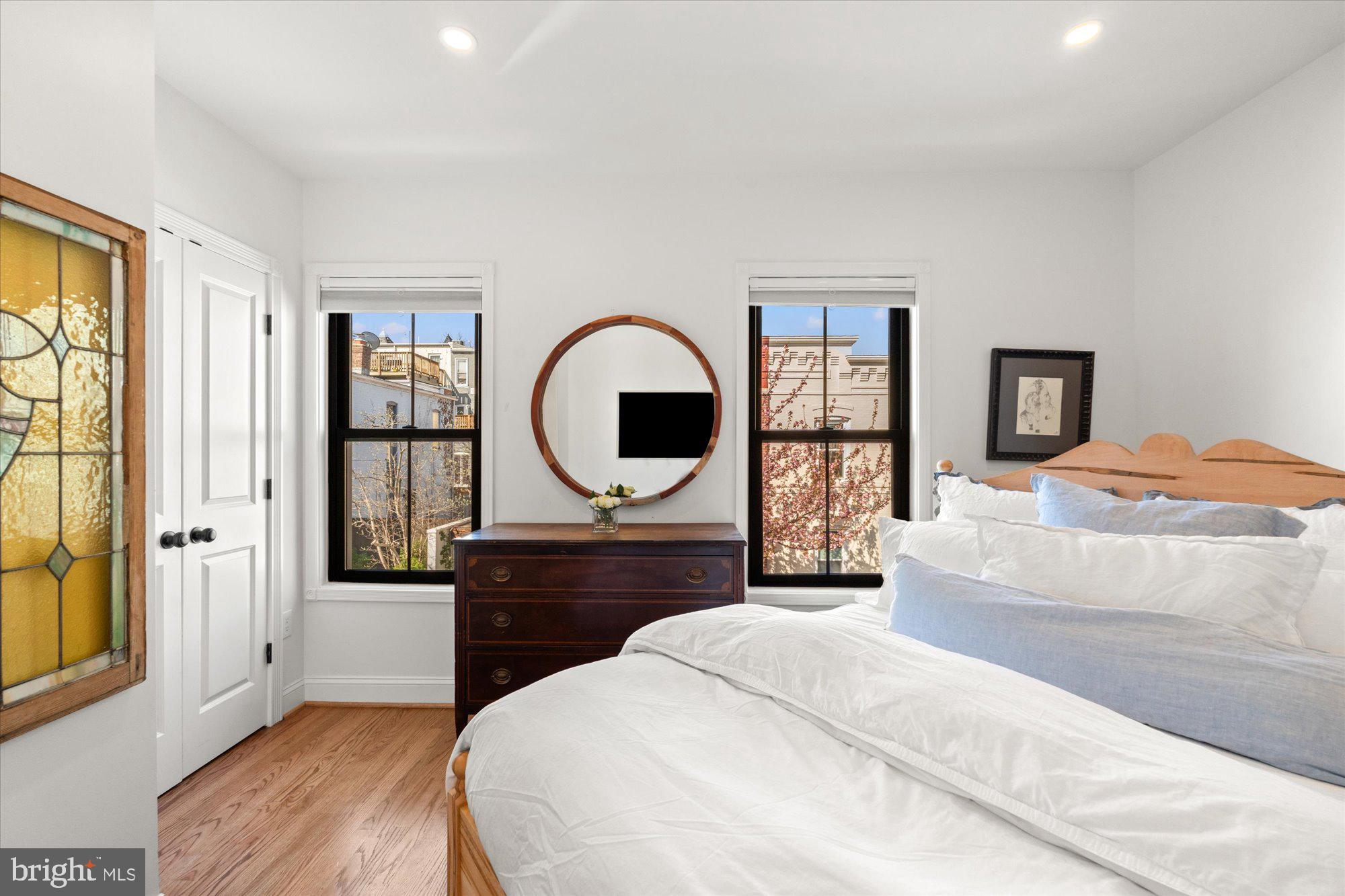 629 Pickford Place Northeast Washington, DC 20002 - Photo 27 of 41 a bedroom with a large bed and a dresser