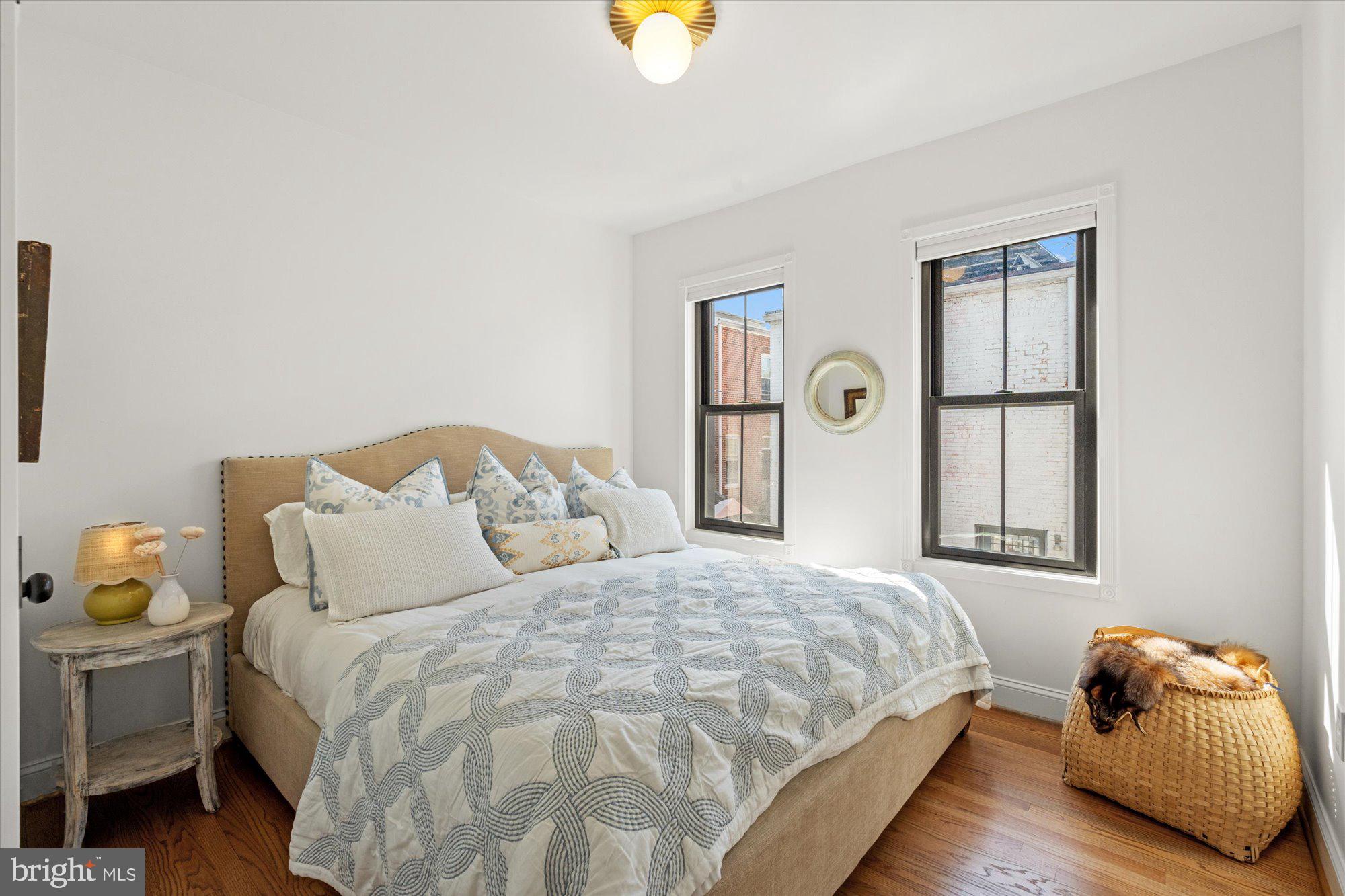 629 Pickford Place Northeast Washington, DC 20002 - Photo 30 of 41 a bedroom with a bed and a window