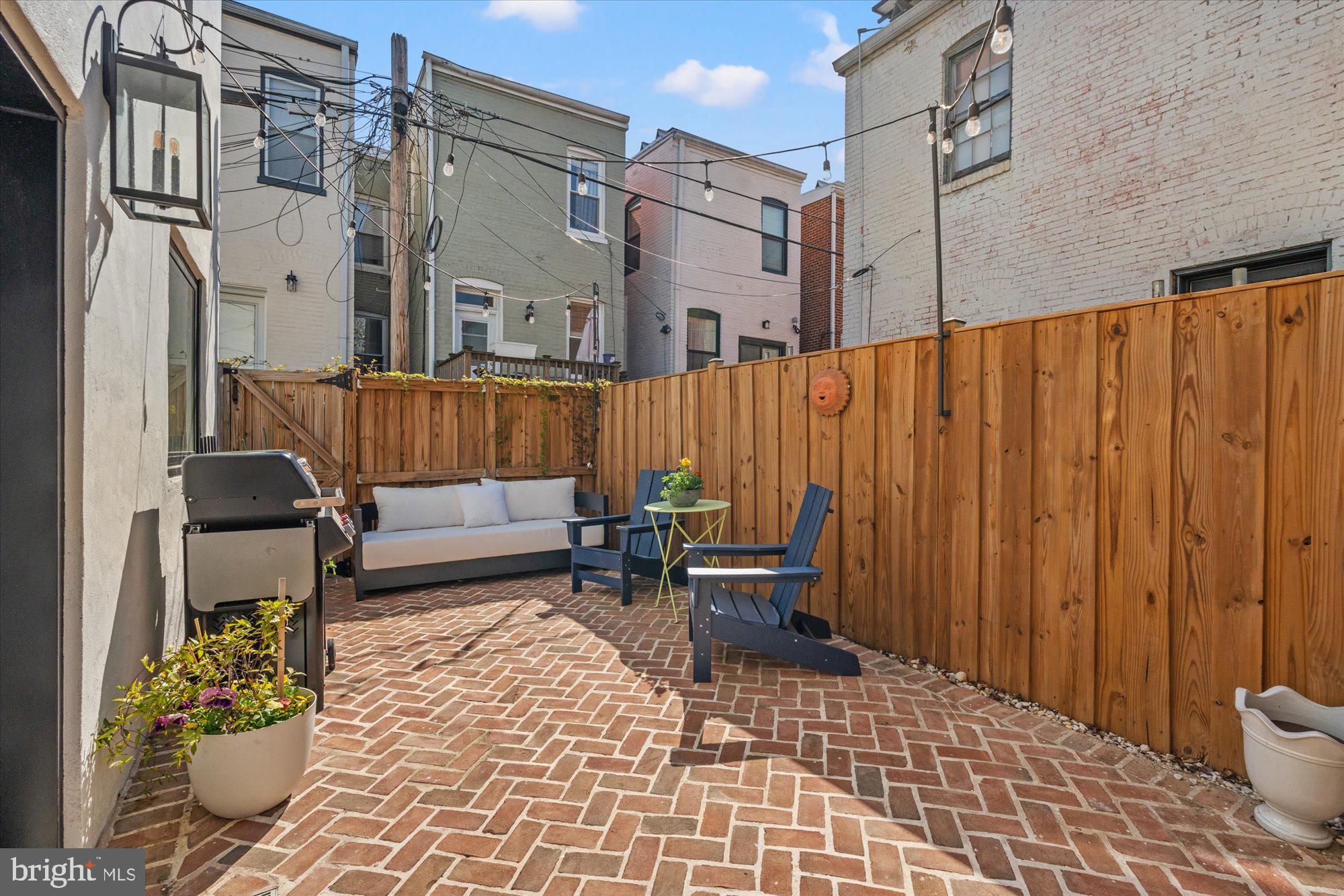 629 Pickford Place Northeast Washington, DC 20002 - Photo 37 of 41 a building outdoor space with patio furniture