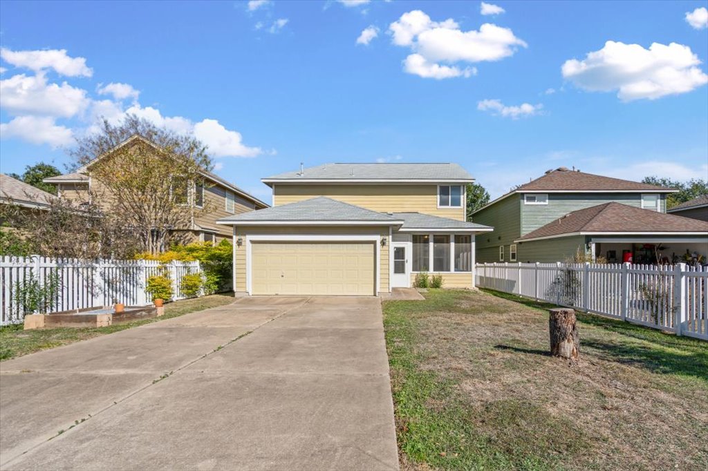 633 Fairway Kyle, TX 78640 - Photo 20 of 22 a view of a house with a yard