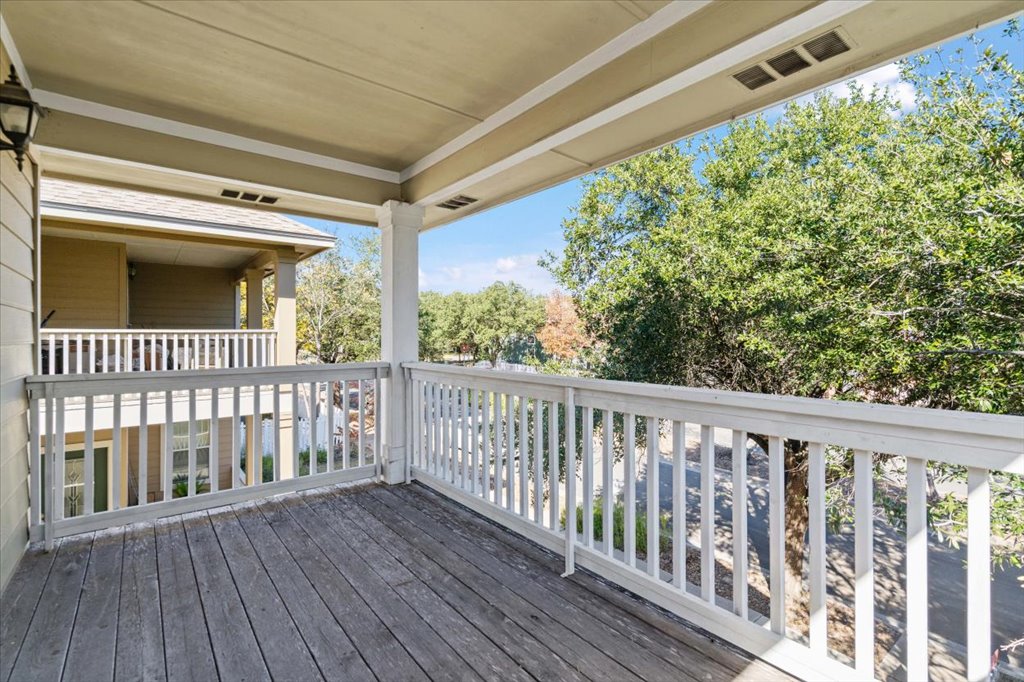 633 Fairway Kyle, TX 78640 - Photo 21 of 22 a view of a balcony with wooden floor