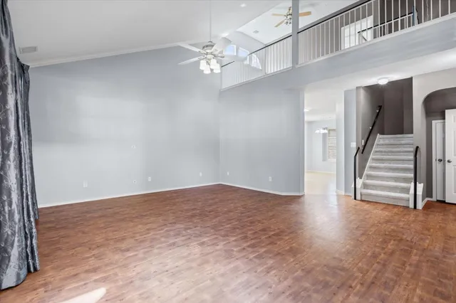 a view of a hallway with staircase