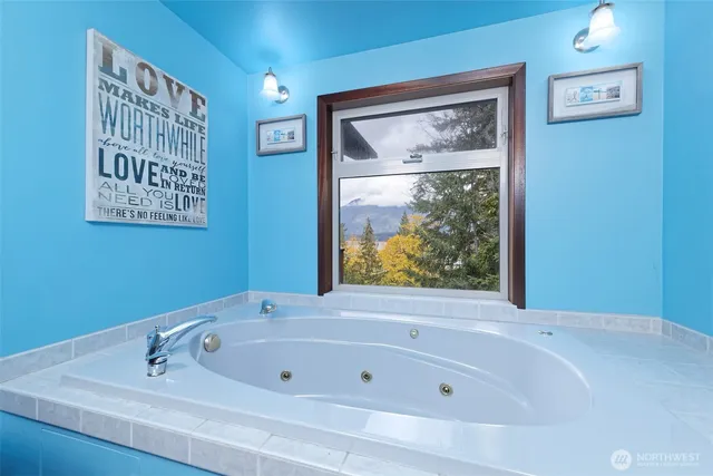 a kitchen with stainless steel appliances granite countertop a cabinets and a stove top oven