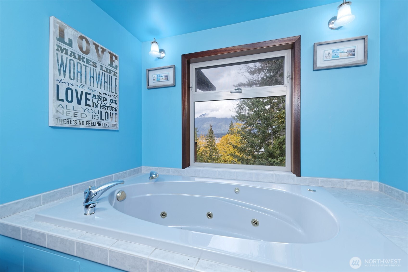 5791 North Lake Cushman Road Hoodsport, WA 98548 - Photo 21 of 39 a bathroom with bathtub and shower