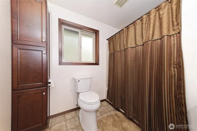 a view of a living room and window