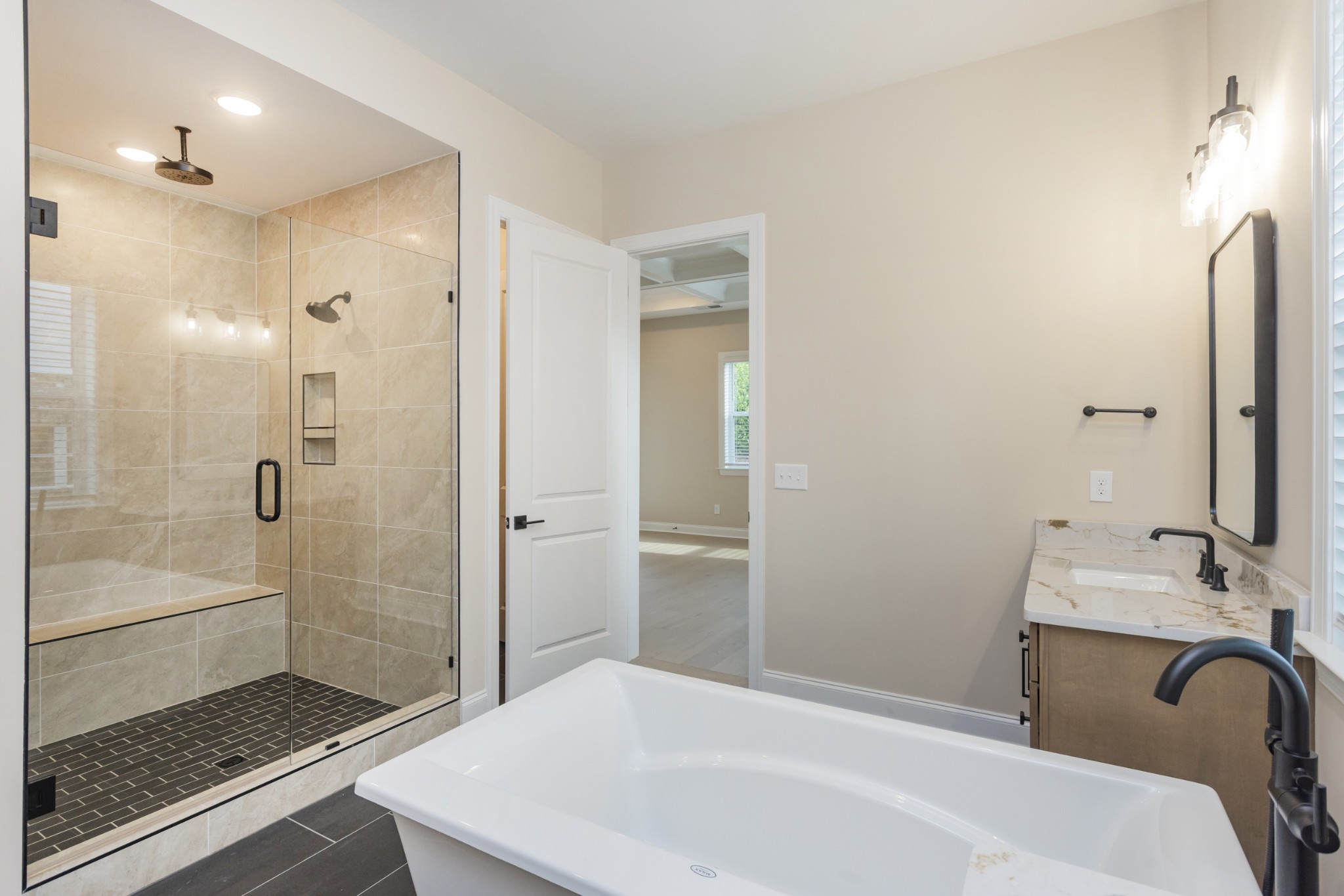 7006 Thunderhead Way Spring Hill, TN 37174 - Photo 31 of 58 a bathroom with a bathtub and a sink