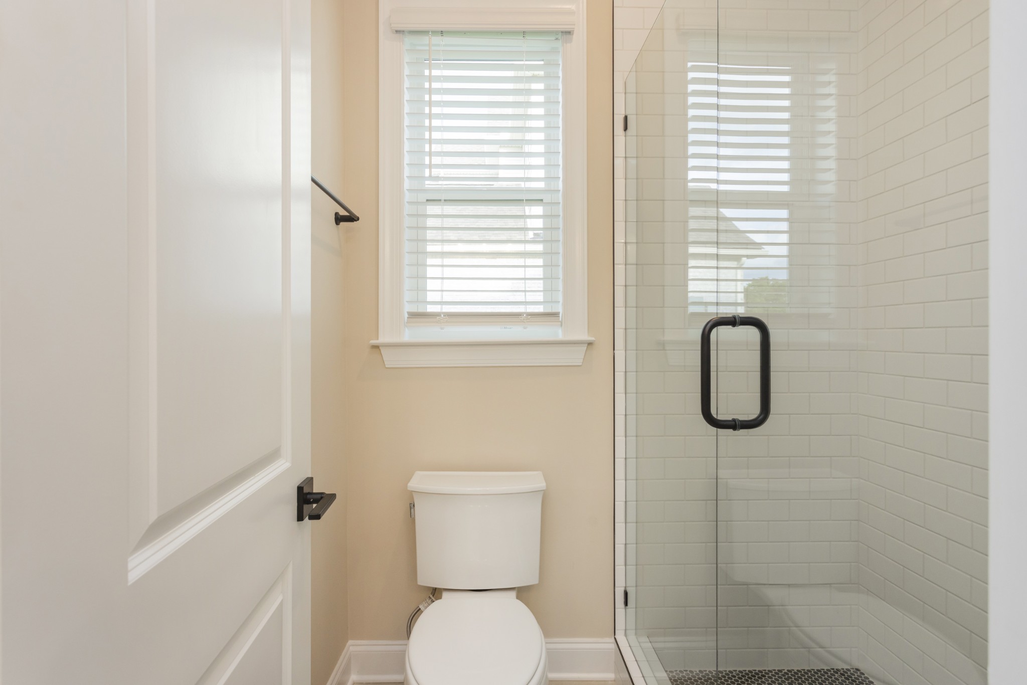7006 Thunderhead Way Spring Hill, TN 37174 - Photo 40 of 58 a bathroom with a toilet and a shower