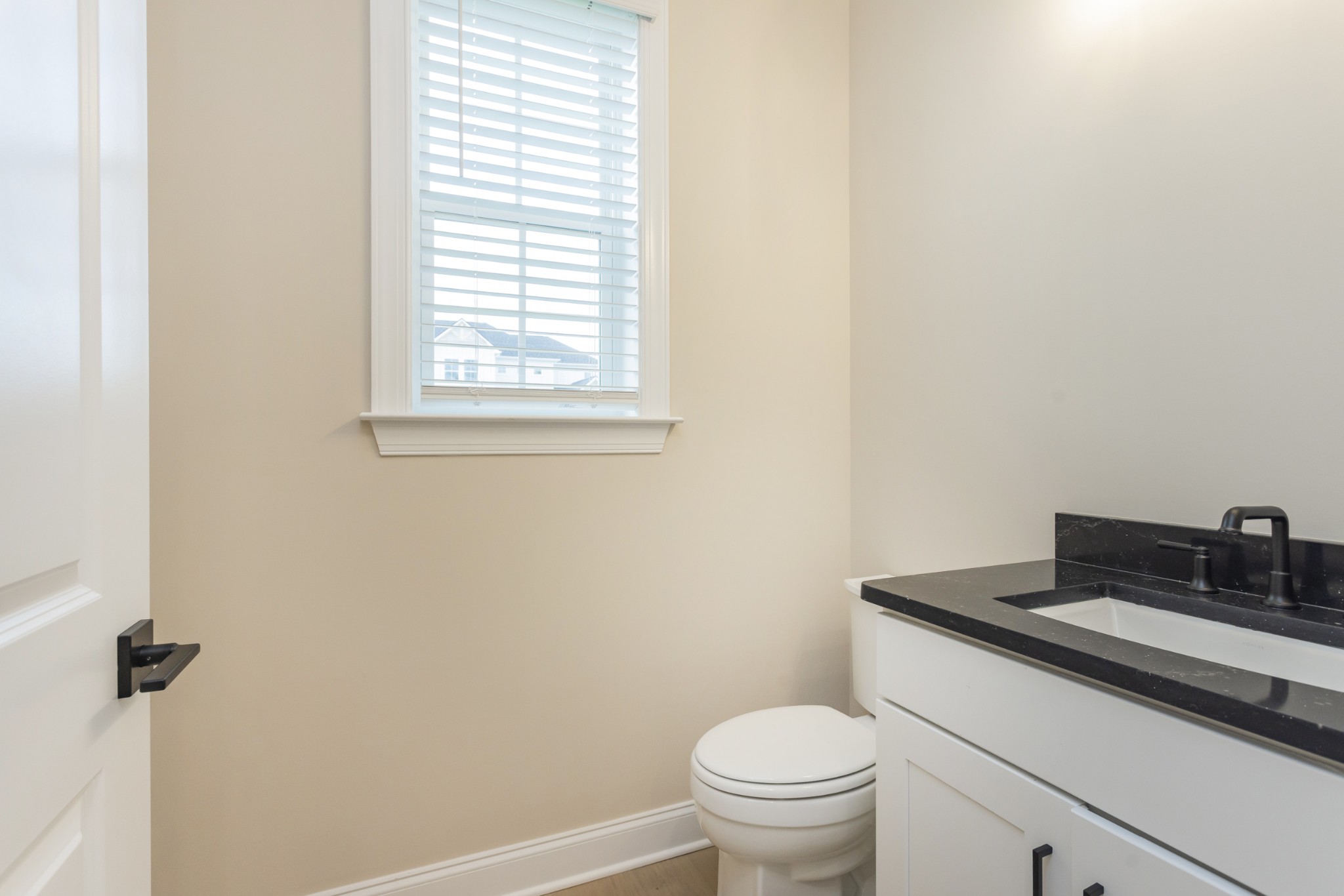 7006 Thunderhead Way Spring Hill, TN 37174 - Photo 44 of 58 a bathroom with a sink and a toilet