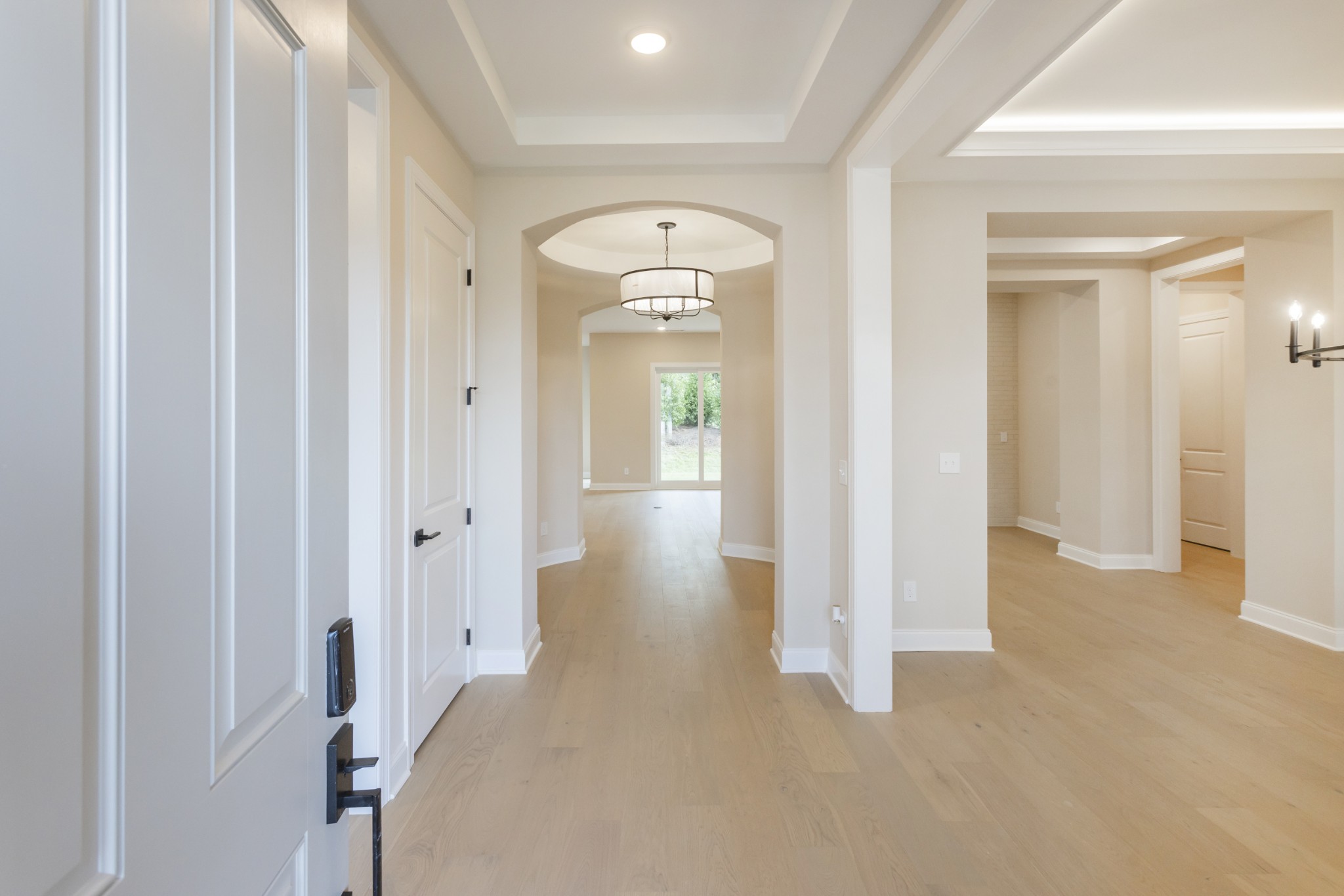 7006 Thunderhead Way Spring Hill, TN 37174 - Photo 5 of 58 a view of a hallway with wooden floor