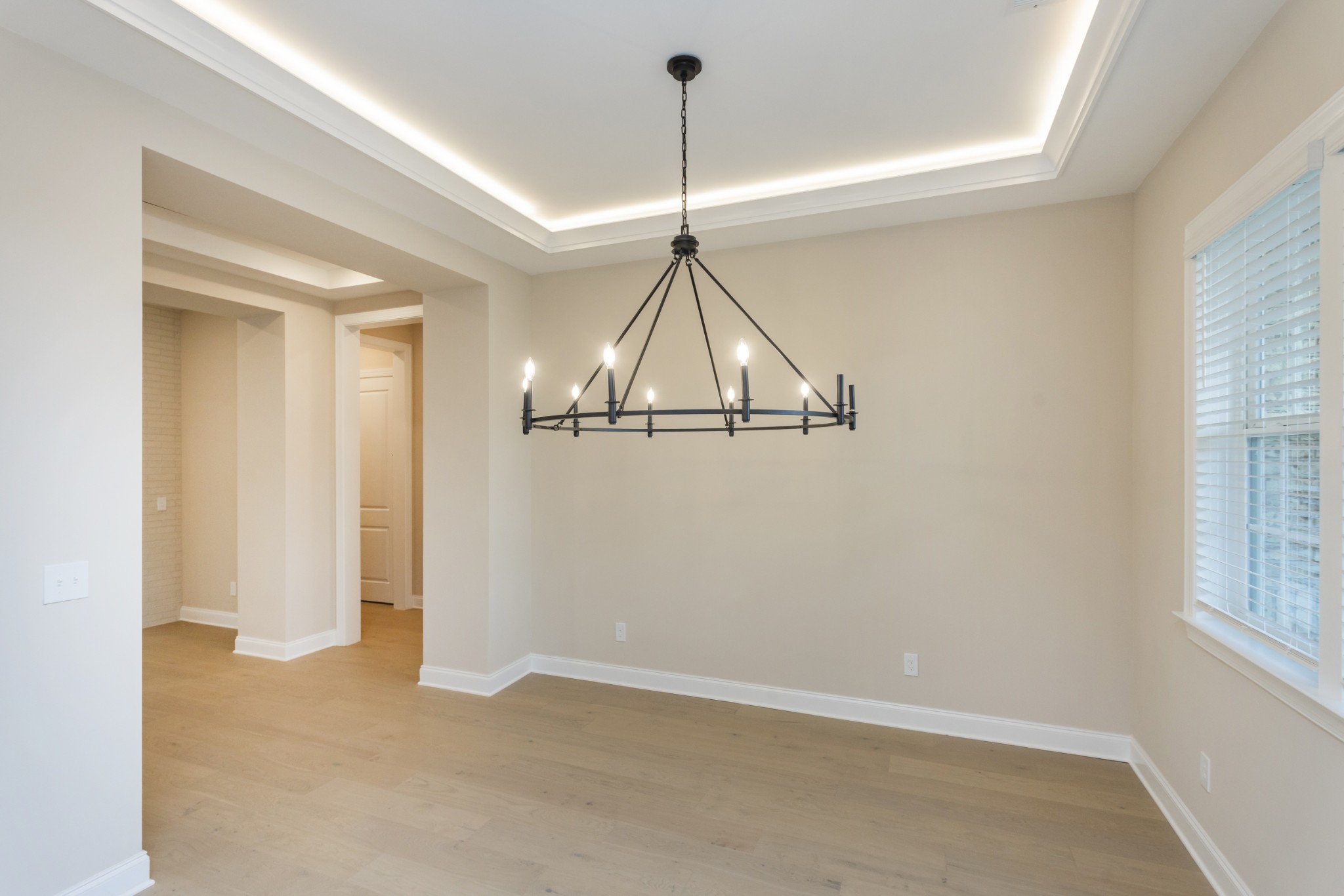 7006 Thunderhead Way Spring Hill, TN 37174 - Photo 6 of 58 en empty room with windows and ceiling fan