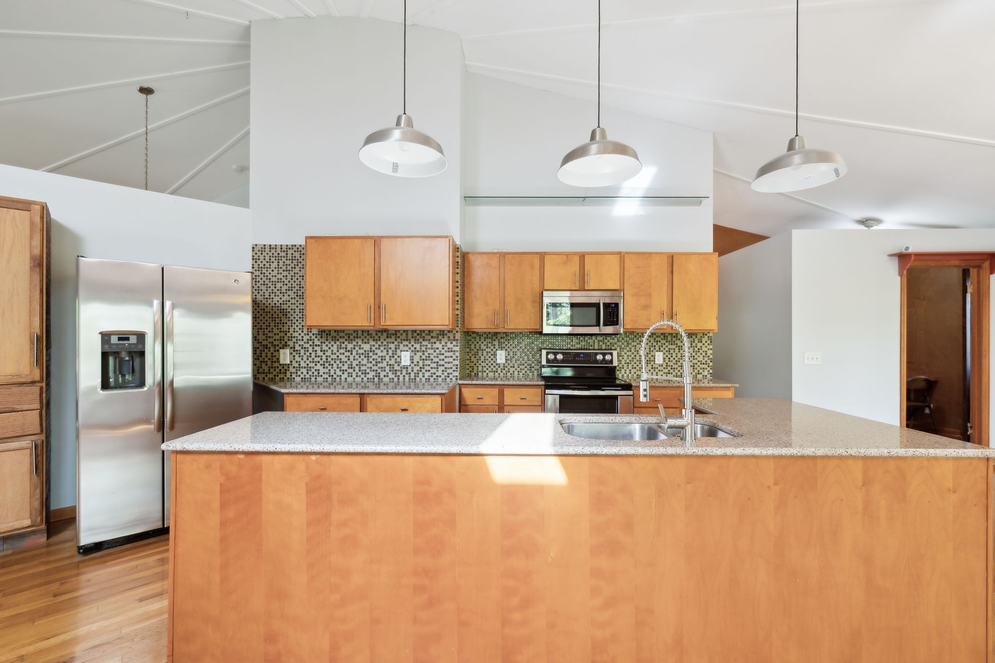 3055 Smith Springs Road Antioch, TN 37013 - Photo 14 of 59 a large kitchen with a large counter top appliances and cabinets