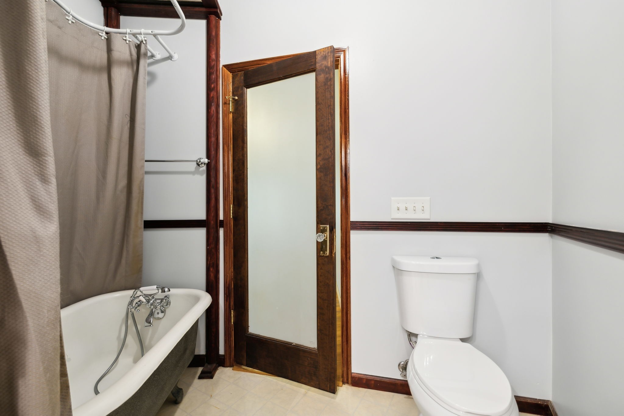 3055 Smith Springs Road Antioch, TN 37013 - Photo 39 of 59 a bathroom with a toilet a sink and a shower