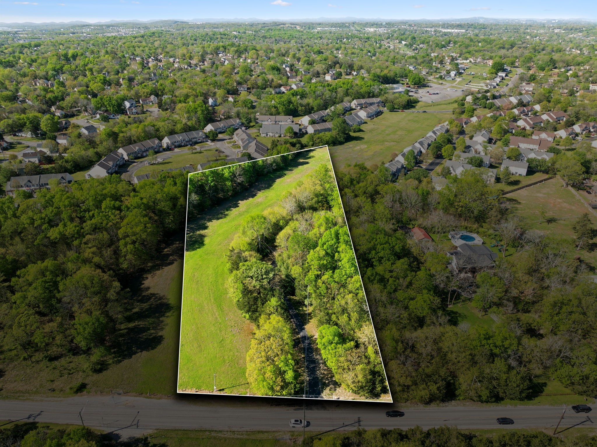 3055 Smith Springs Road Antioch, TN 37013 - Photo 52 of 59 an aerial view of residential houses with outdoor space and trees