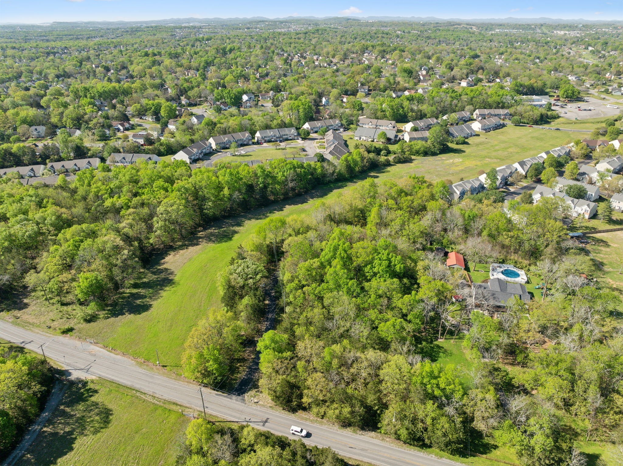 3055 Smith Springs Road Antioch, TN 37013 - Photo 54 of 59 an aerial view of residential houses with outdoor space and trees