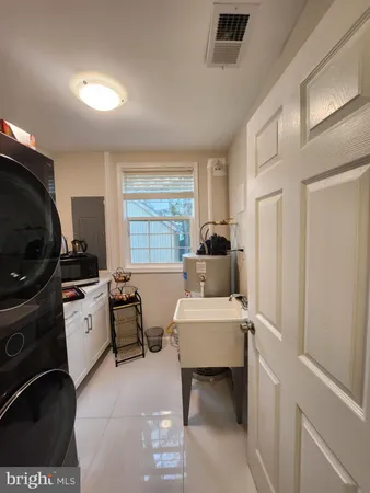 a room with a bed and furniture