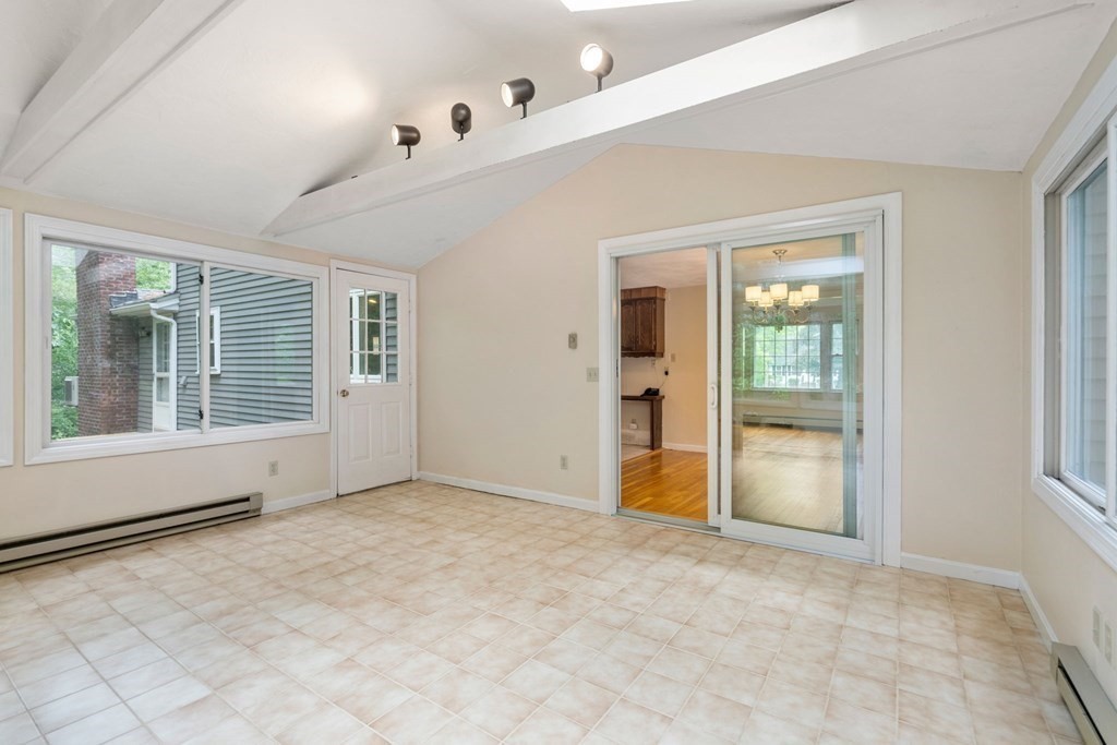 5 Parmenter Road Sudbury, MA 01776 - Photo 15 of 33 an empty room with windows and closet