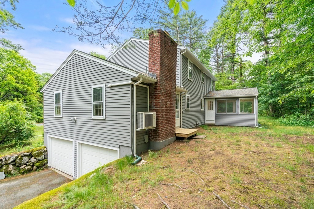 5 Parmenter Road Sudbury, MA 01776 - Photo 28 of 33 a view of a house with a yard