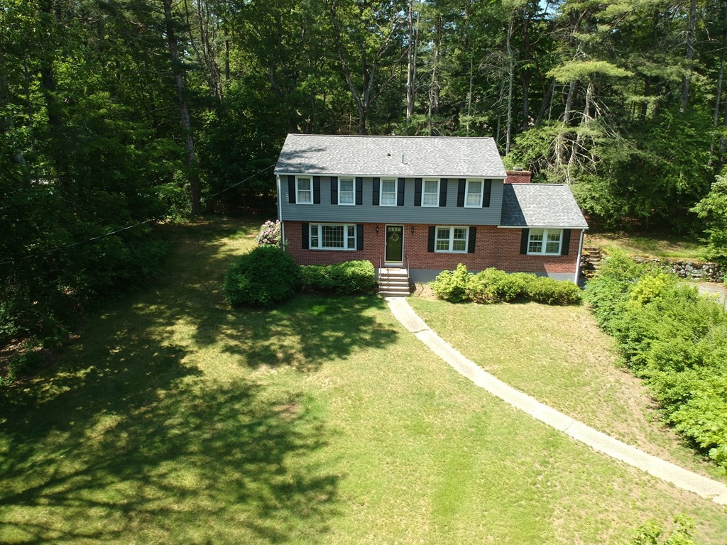 5 Parmenter Road Sudbury, MA 01776 - Photo 4 of 33 a view of a house with a garden