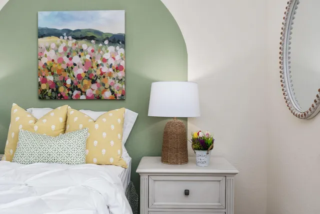 a bed room with a bed and a couch