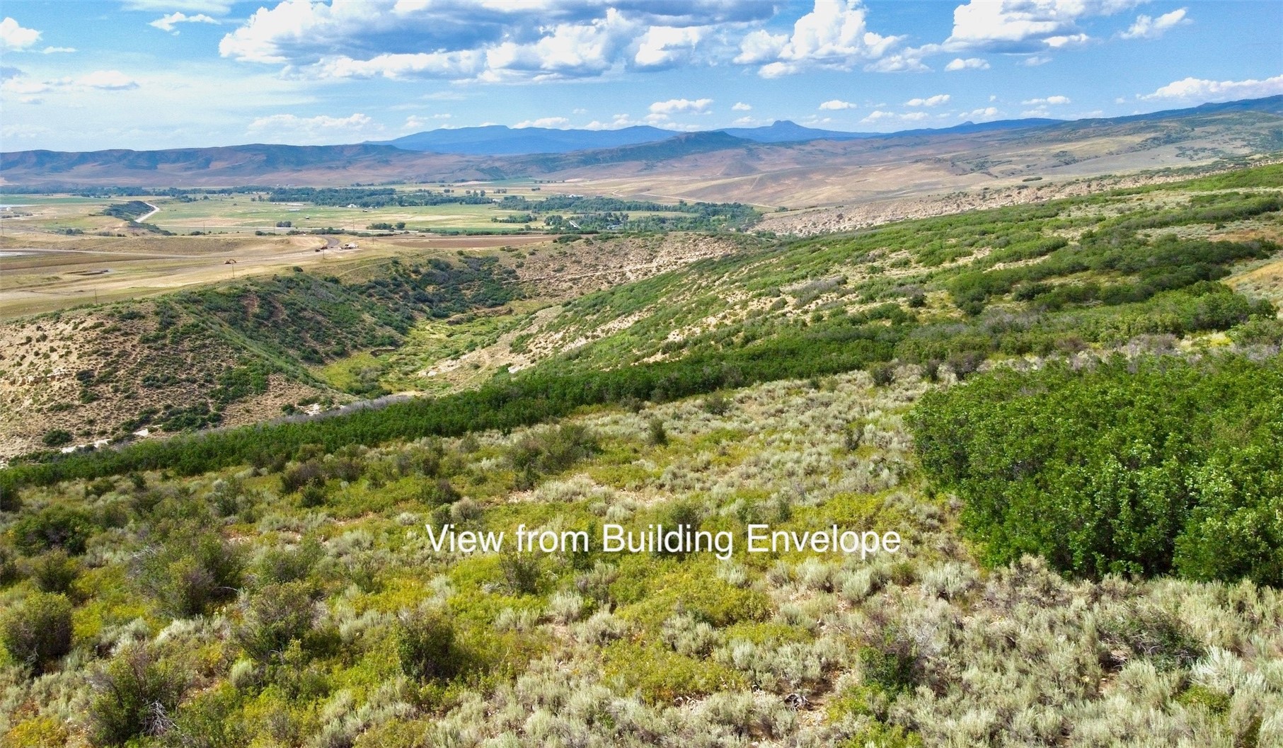 37700 Whitestone Place Hayden, CO 81639 - Photo 1 of 8 a view of lake with mountain