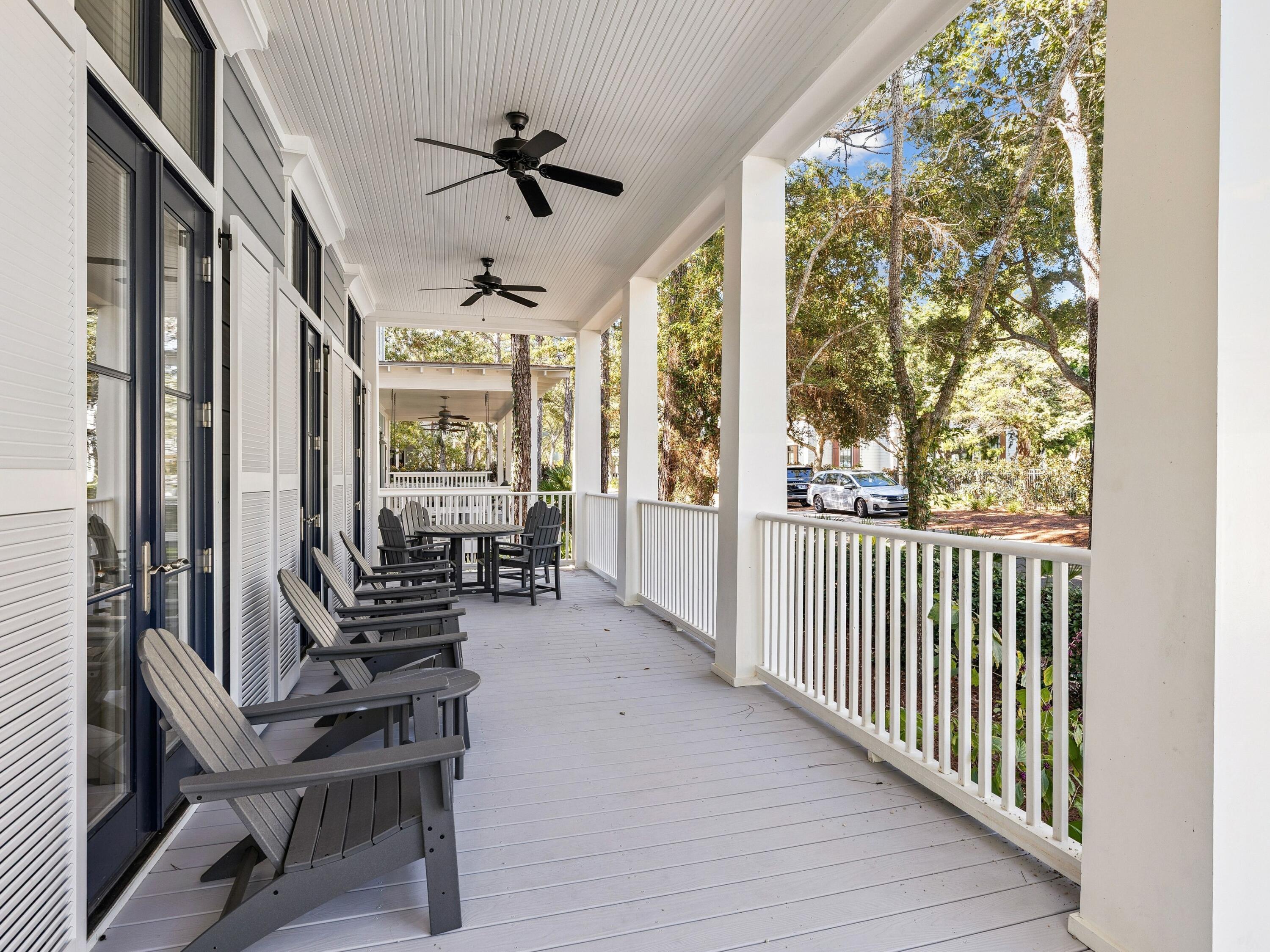 134 Spartina Circle Santa Rosa Beach, FL 32459 - Photo 11 of 41 a room with lots of wooden furniture and a chandelier