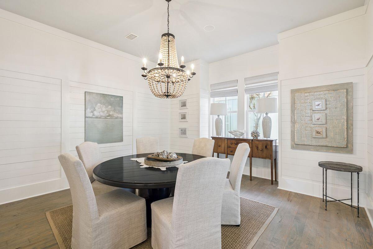 134 Spartina Circle Santa Rosa Beach, FL 32459 - Photo 17 of 41 a view of a dining room with furniture window and wooden floor