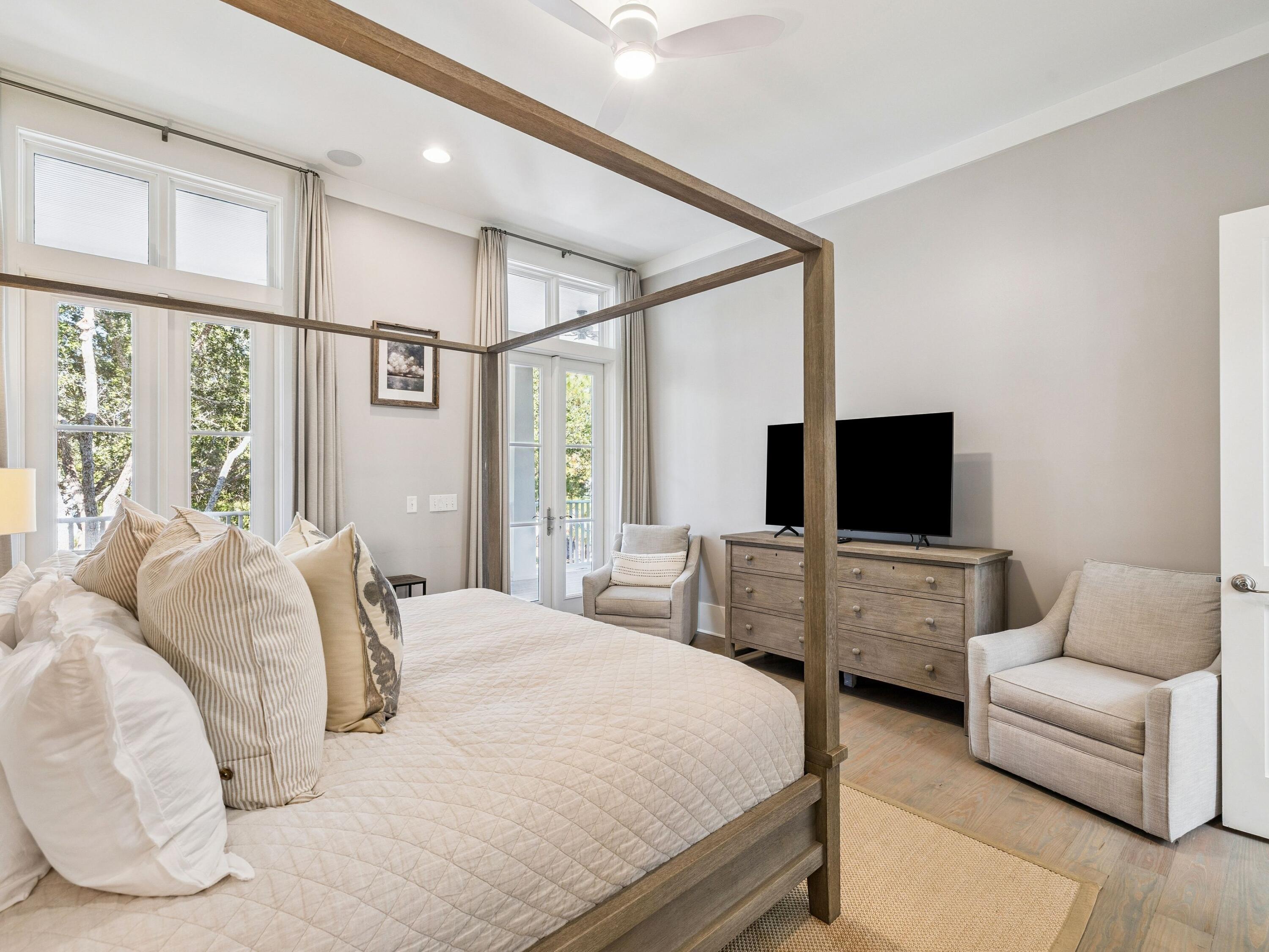 134 Spartina Circle Santa Rosa Beach, FL 32459 - Photo 26 of 41 a bedroom with a bed and a flat screen tv