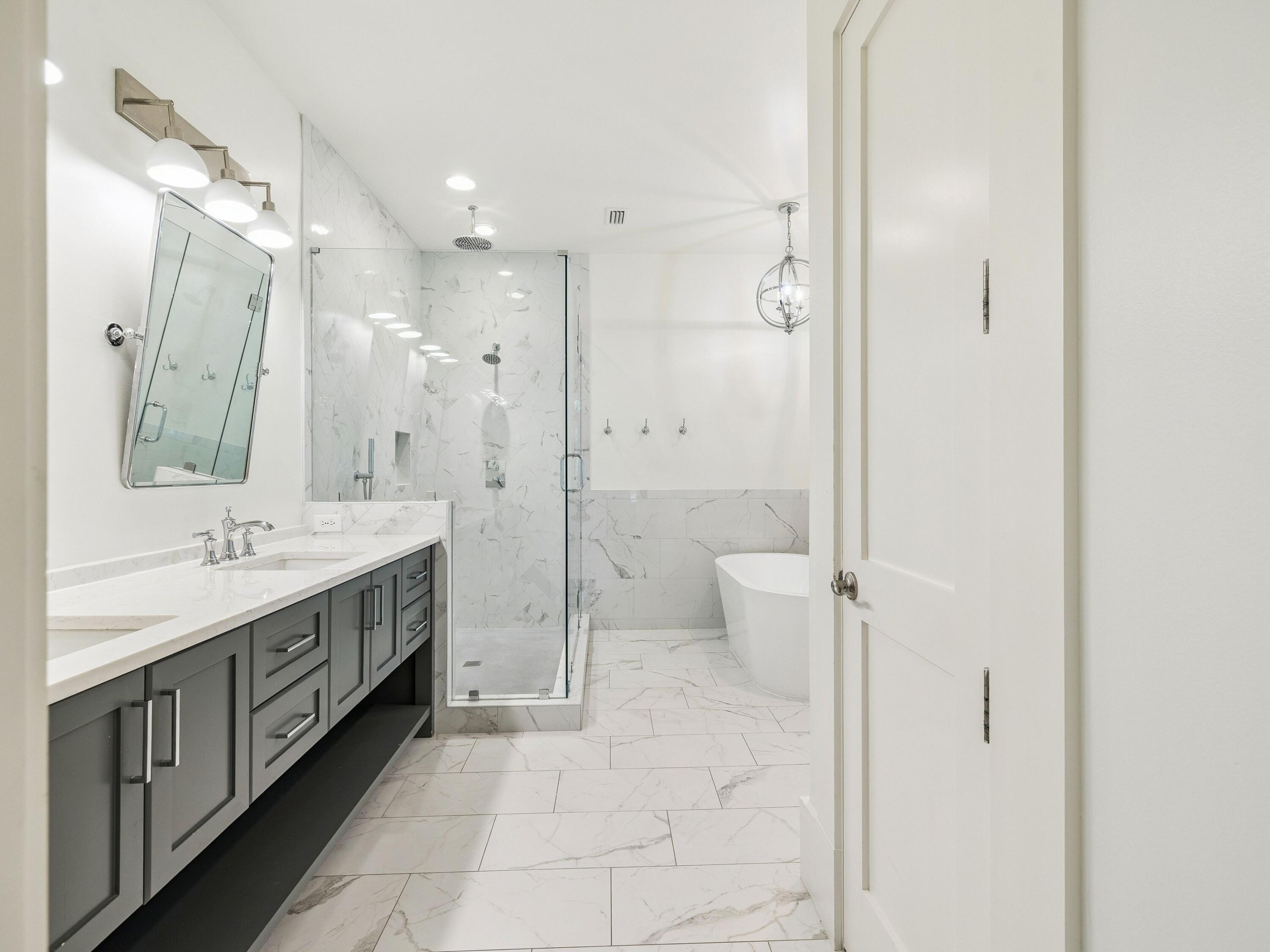 134 Spartina Circle Santa Rosa Beach, FL 32459 - Photo 27 of 41 a spacious bathroom with a double vanity sink toilet and shower